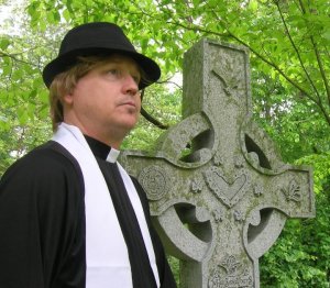 Jeff Swan as the "Reverend"